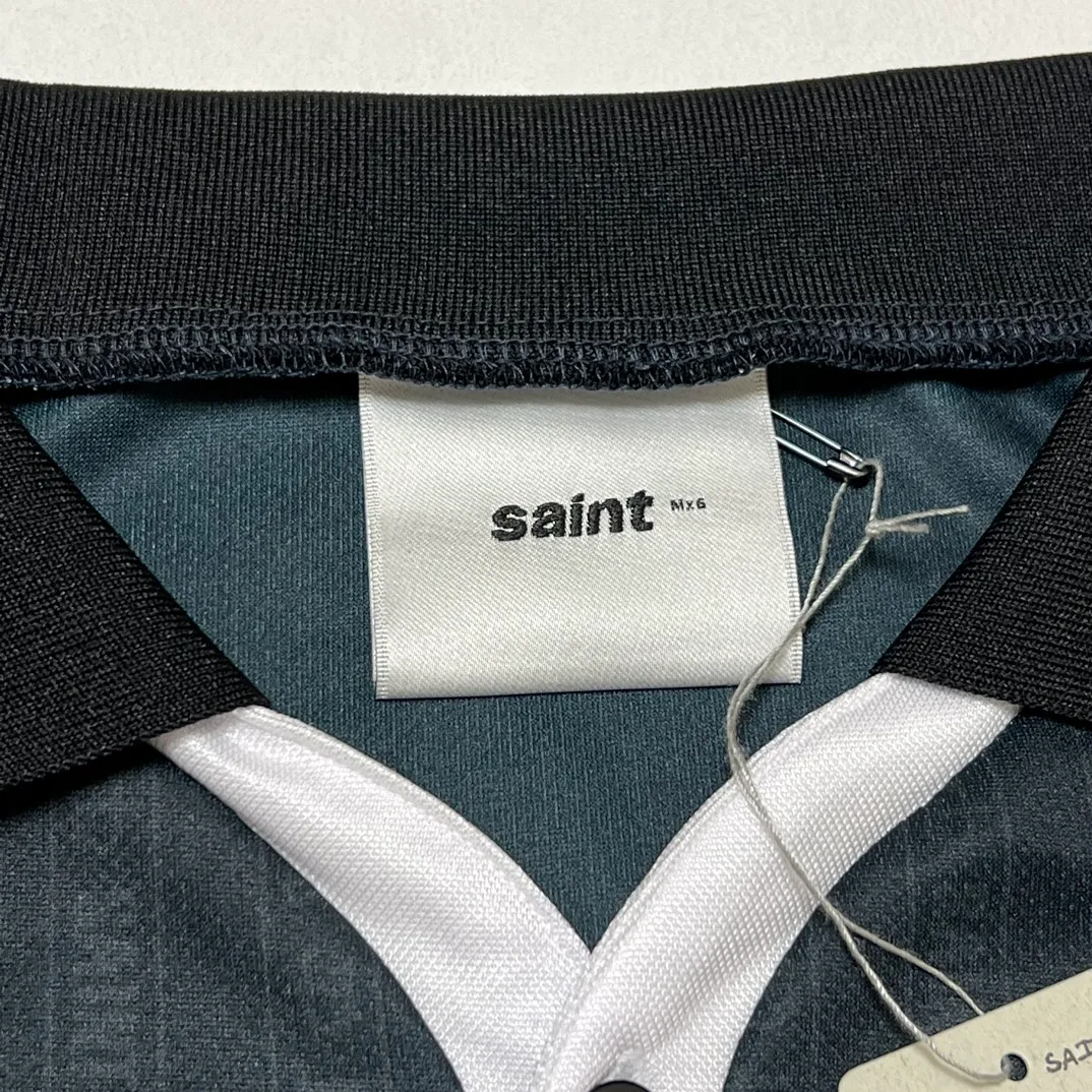 SAINT M×××××× SOCCER SHIRT 'FAITH'/BLK FAITH Football Long Sleeve Black S-XL This design has a lot of craftsmanship Digital fabric printing/front positioning printing laser cutting Offset printing + flocking printing + embossing Imported Behringer machine embroidery Flat machine collar + cuffs Genuine consistent main mark/wash mark/cherub mark